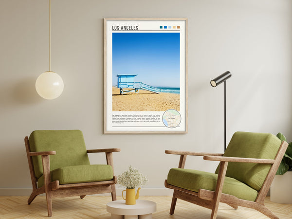 Descriptive Minimalist Los Angeles Poster in Wooden Frame displayed in a living room with green chairs.