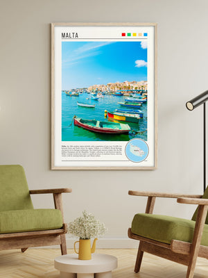 Descriptive Minimalist Malta Poster in Wooden Frame displayed in a living room with green chairs.