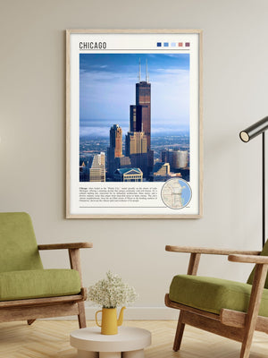 Descriptive Minimalist Willis Tower Poster in Wooden Frame displayed in a living room with green chairs.