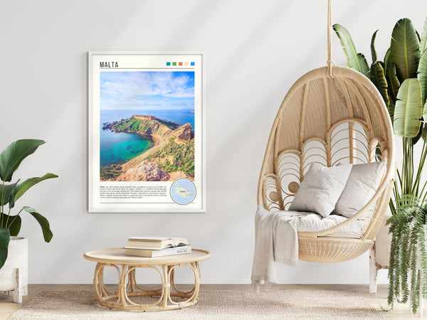 Descriptive Minimalist Malta Poster in White Frame displayed in a modern living room with a wicker chair.