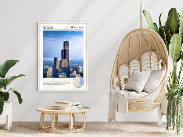 Descriptive Minimalist Willis Tower Poster in White Frame displayed in a modern living room with a wicker chair.