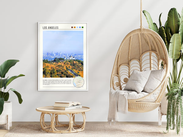 Descriptive Minimalist Los Angeles Poster in White Frame displayed in a modern living room with a wicker chair.