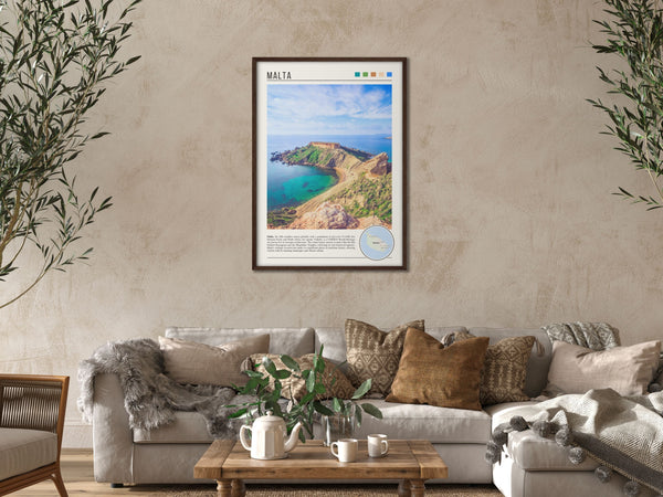 Descriptive Minimalist Malta Poster in Dark Wooden Frame displayed in a cozy living room with a beige sofa.