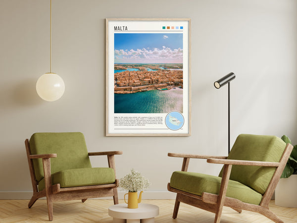 Descriptive Minimalist Malta Poster in Wooden Frame displayed in a living room with green chairs.