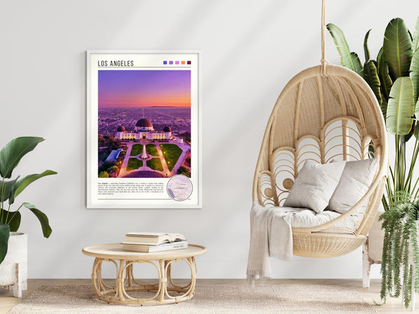 Descriptive Minimalist Griffith Observatory Poster in White Frame displayed in a modern living room with a wicker chair.