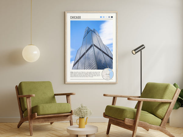 Descriptive Minimalist Willis Tower Poster in Wooden Frame displayed in a living room with green chairs.