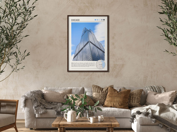 Descriptive Minimalist Willis Tower Poster in Dark Wooden Frame displayed in a cozy living room with a beige sofa.