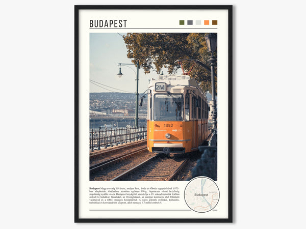 Descriptive Minimalist Budapest Poster in Black Frame displayed in a living room with a gray armchair.