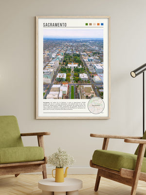 Descriptive Minimalist Sacramento Poster in Wooden Frame displayed in a living room with green chairs.