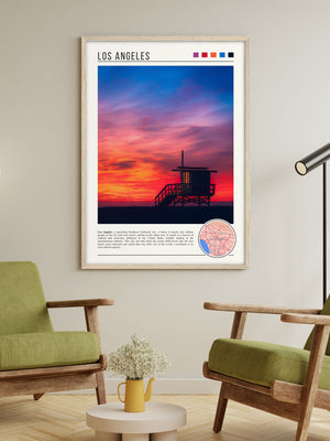 Descriptive Minimalist Los Angeles Poster in Wooden Frame displayed in a living room with green chairs.