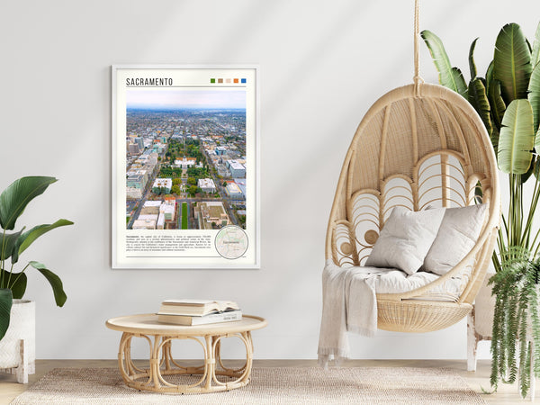 Descriptive Minimalist Sacramento Poster in White Frame displayed in a modern living room with a wicker chair.