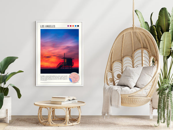 Descriptive Minimalist Los Angeles Poster in White Frame displayed in a modern living room with a wicker chair.