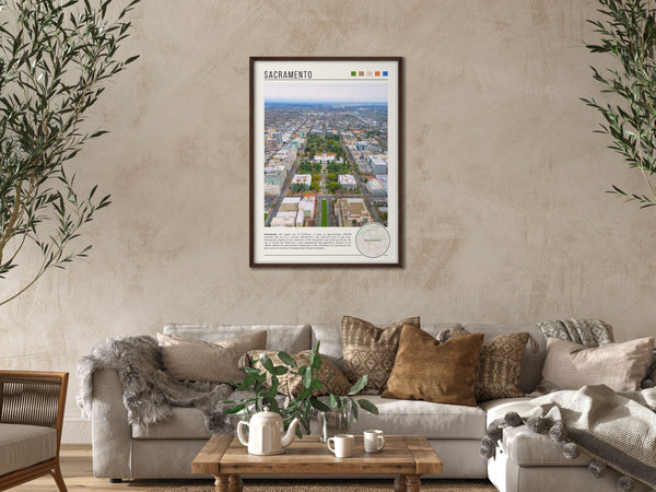 Descriptive Minimalist Sacramento Poster in Dark Wooden Frame displayed in a cozy living room with a beige sofa.