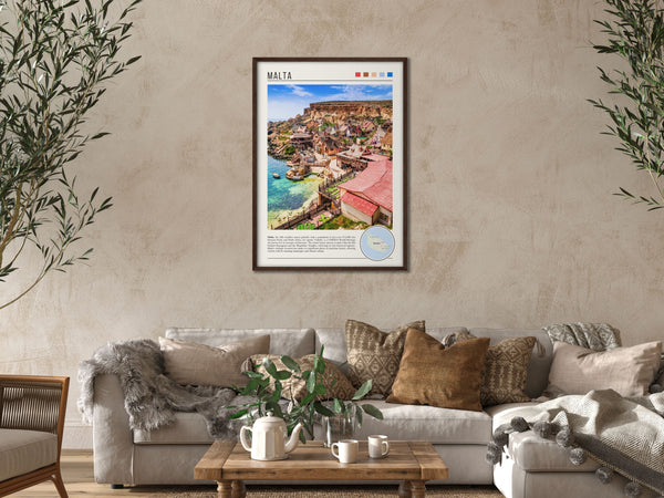 Descriptive Minimalist Malta Poster in Dark Wooden Frame displayed in a cozy living room with a beige sofa.