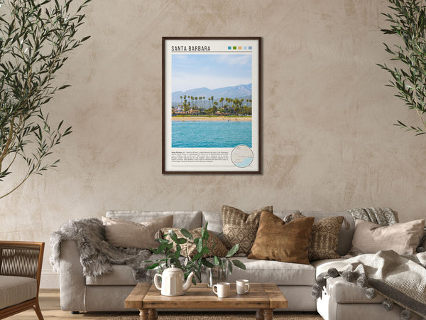 Descriptive Minimalist Santa Barbara Poster in Dark Wooden Frame displayed in a cozy living room with a beige sofa.