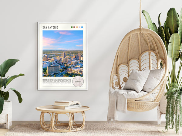 Descriptive Minimalist San Antonio Poster in White Frame displayed in a modern living room with a wicker chair.