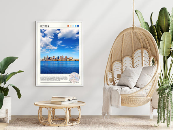 Descriptive Minimalist Boston Poster in White Frame displayed in a modern living room with a wicker chair.